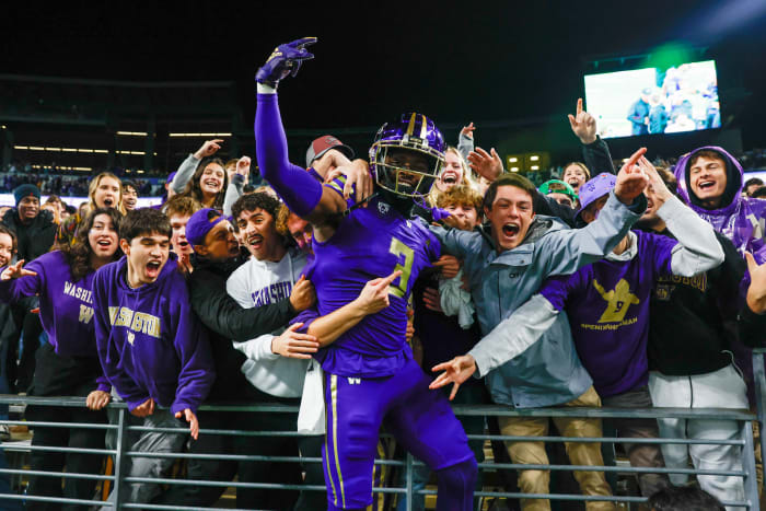 Oct 21, 2023; Seattle, Washington, USA; Washington Huskies safety Mishael Powell (3) celebrates with fans in the student section following a 15-7 victory against the Arizona State Sun Devils at Alaska Airlines Field at Husky Stadium.